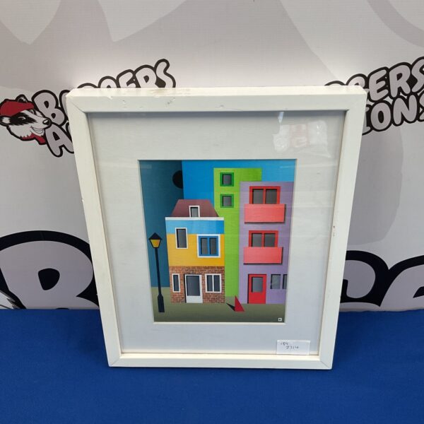 Vibrant Kumataro Black Moon Street artwork featuring colourful buildings.