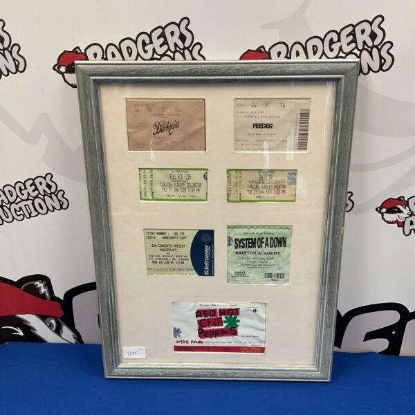 Framed concert tickets featuring System of a Down and Red Hot Chili Peppers.