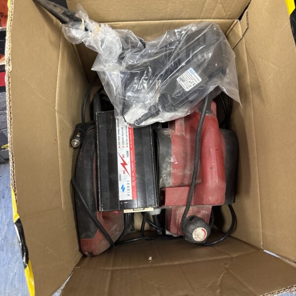 Mixed lot including a power inverter and other items.