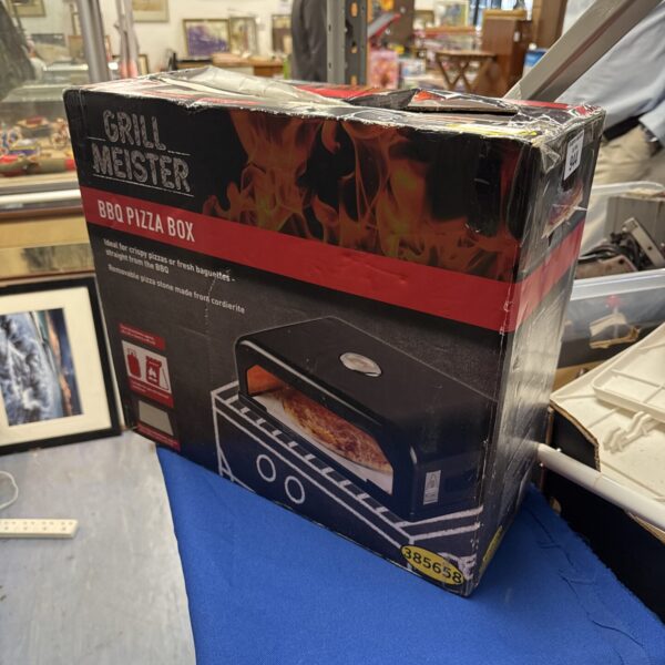 Grill Meister pizza box for creating delicious grilled pizzas.