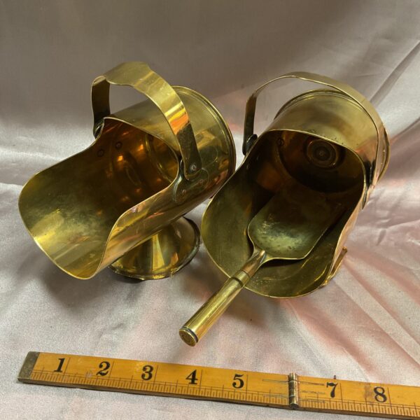 Antique WWI trench art coal skuttles dated 1915, a unique collectible.