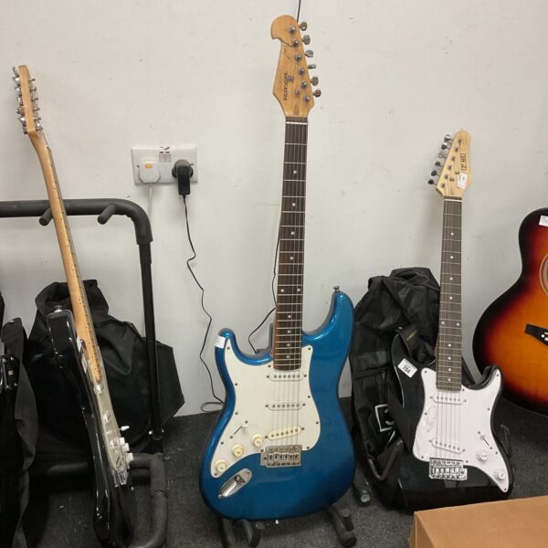 Blue Fender Stratocaster electric guitar, vintage musical instrument.