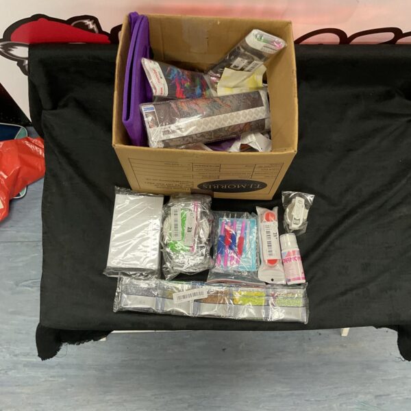Mixed arts and crafts lot with paints and diamond art supplies.