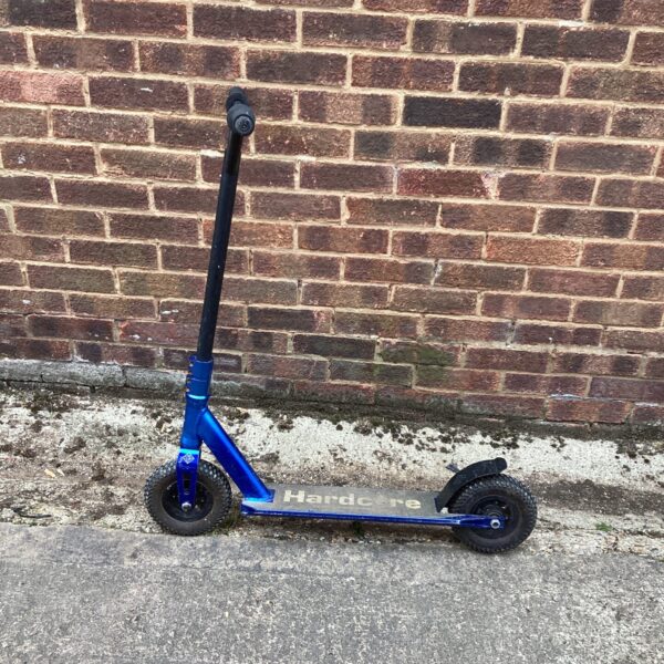 Blue Hardcore freestyle scooter for trick riding and skate park use.