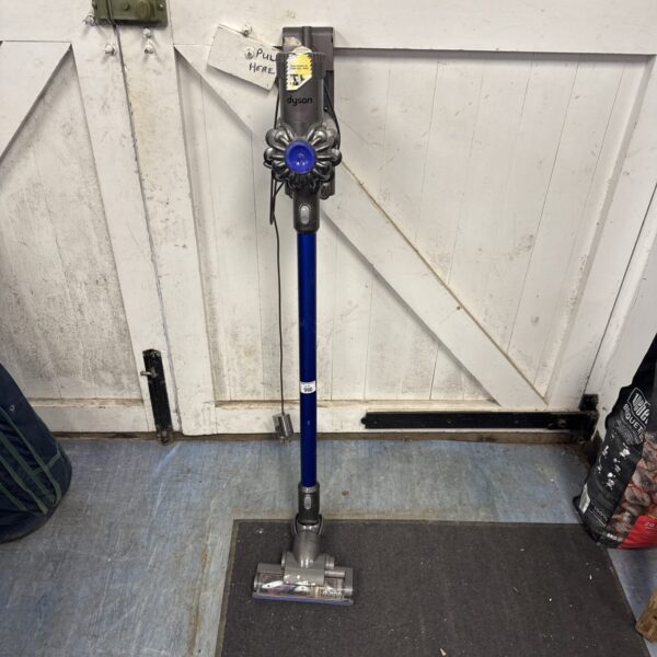 Front view of a Dyson V8 cordless vacuum cleaner.