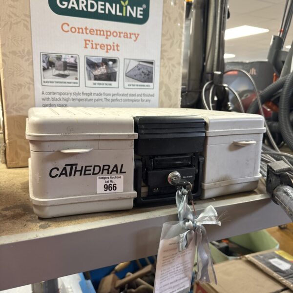 Metal Cathedral locking documents box for secure storage.