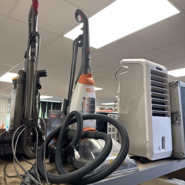 Used Vax Rapide Deluxe carpet cleaner with hose and attachments.