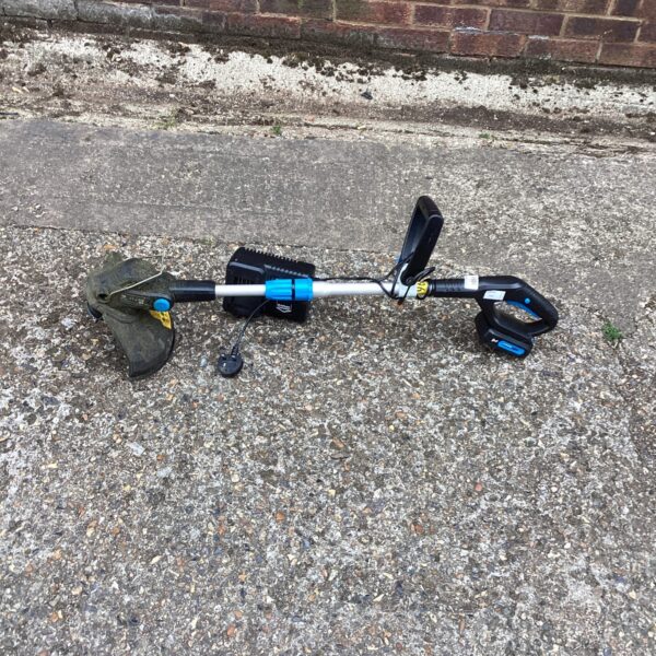 Used MAC battery powered garden strimmer for lawn and edge maintenance.