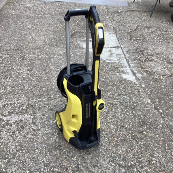 Front view of a Karcher power washer for spares or repair.