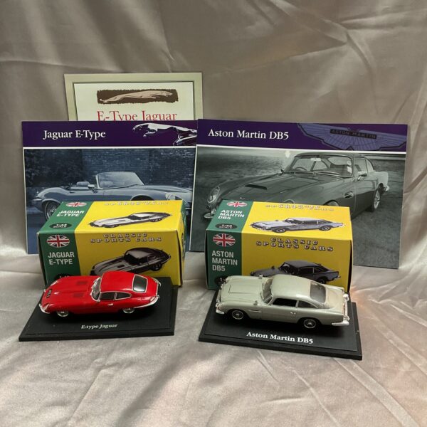 Pair of classic 1:43 scale Jaguar E Type and Aston Martin DB5 diecast models.