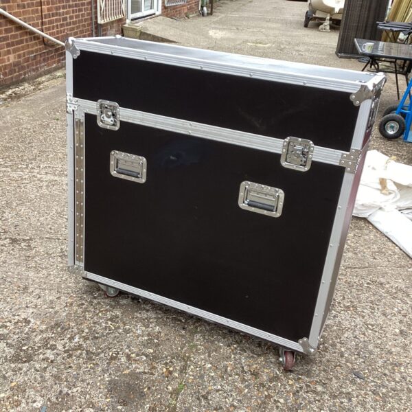 Large wheeled transport case for equipment protection.