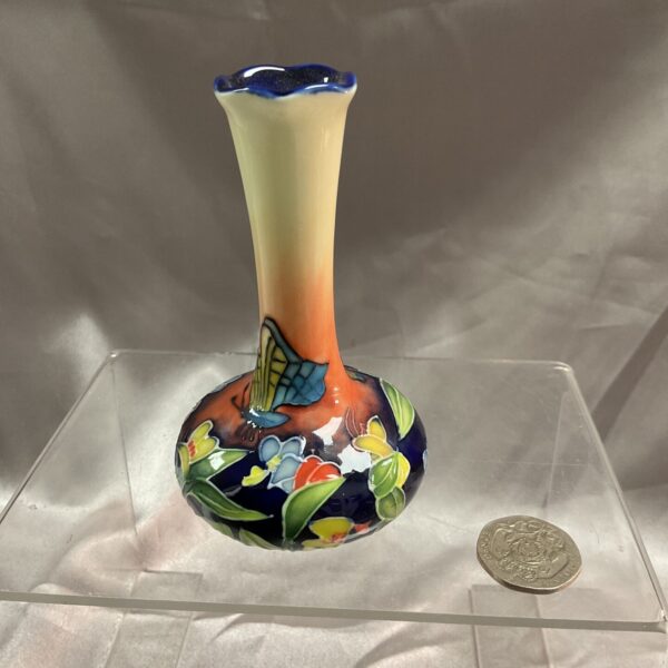 Antique Old Tipton Ware vase with floral design.