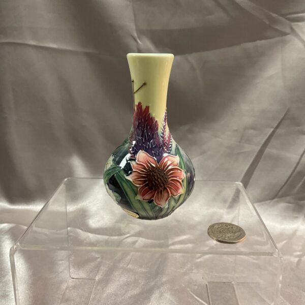 Antique Old Tipton Ware vase with floral design.