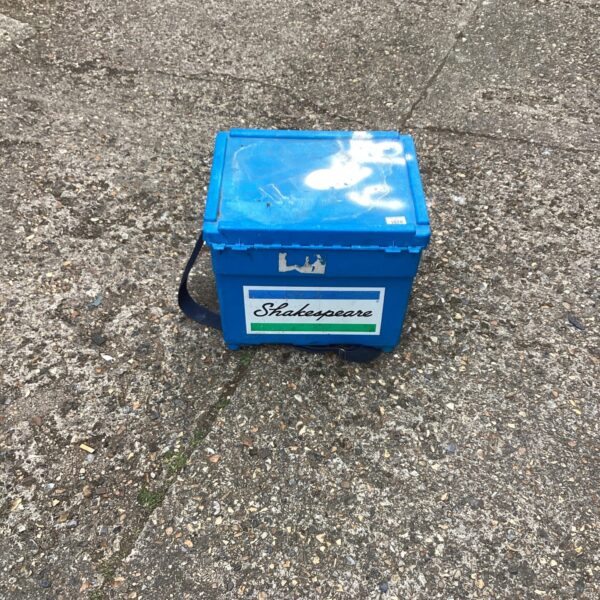 Vintage blue Shakespeare fishing box with carry handle.