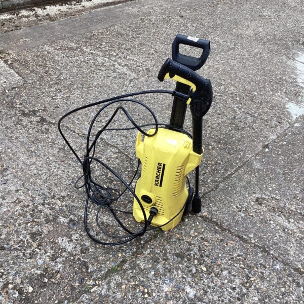 Front view of a Karcher power washer for garden cleaning.