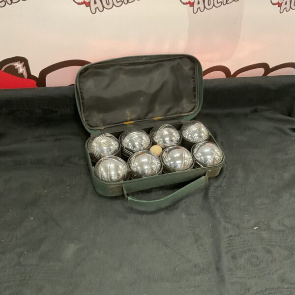 Vintage Jaques boules set with steel boules in a canvas bag.