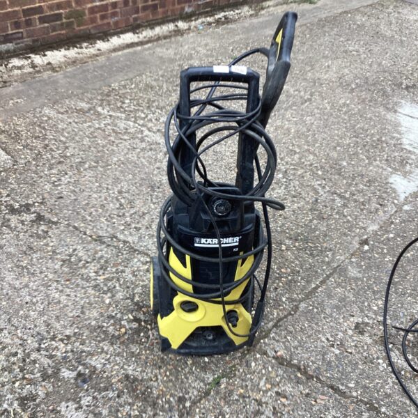 Front view of a Karcher power washer for garden and patio cleaning.
