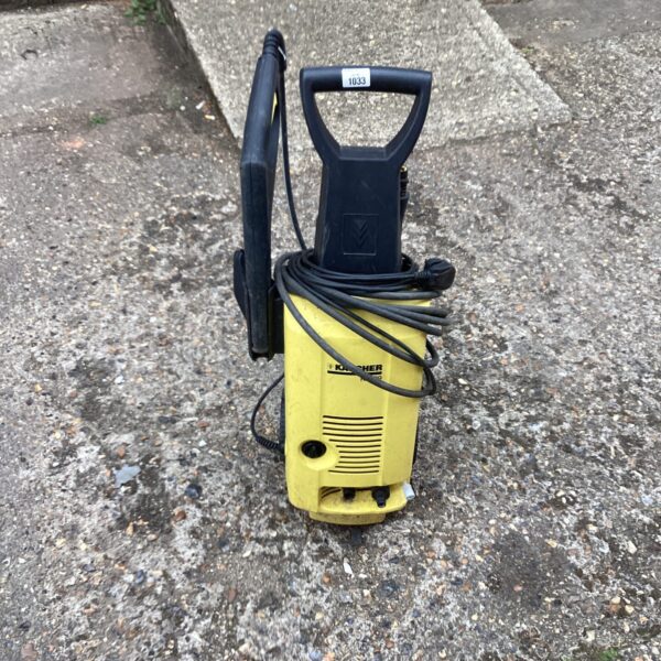 Front view of a Karcher power washer for garden and patio cleaning.