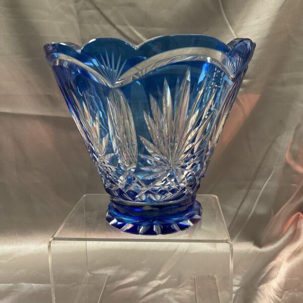 Stunning vintage Bohemian blue glass vase with cut detailing.