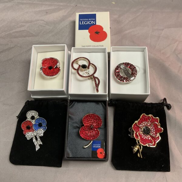 Lot of six Royal British Legion poppy brooches for Remembrance Day.