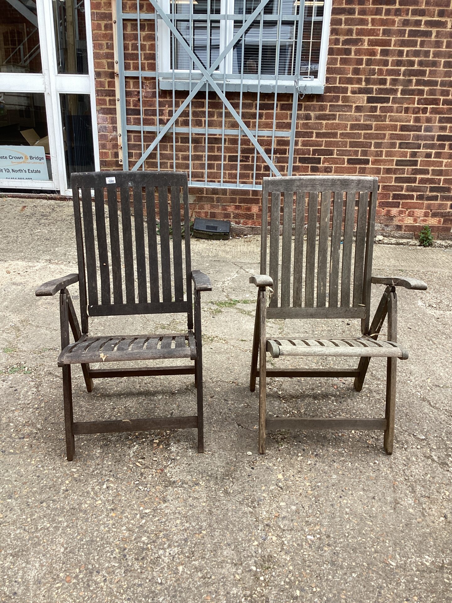 1080 Two hardwood garden chairs