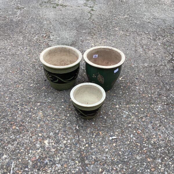 Trio of vintage glazed garden pots for outdoor plants.