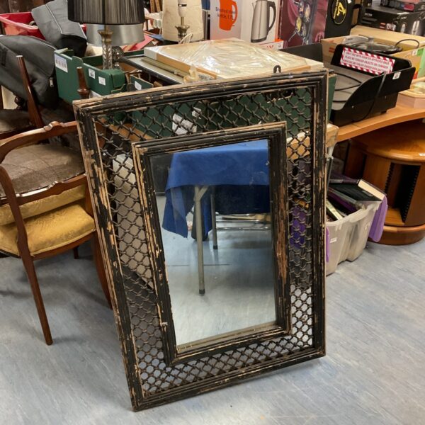 Vintage lattice framed mirror with wooden and metal detailing.