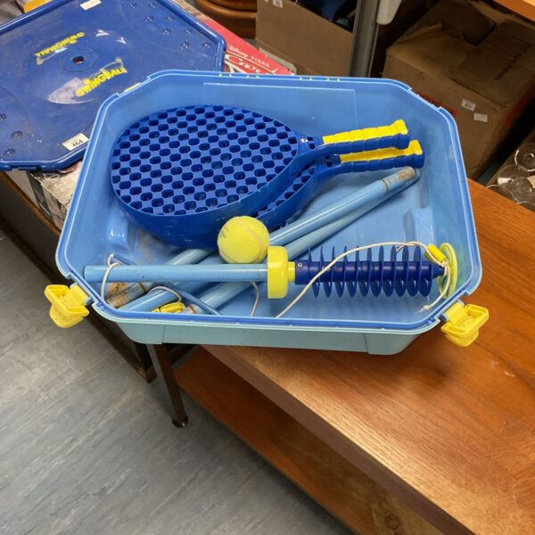 Blue Swimgball game set with bats and ball.