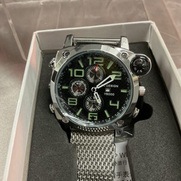Front view of the black and silver Watch DVR Y8000.