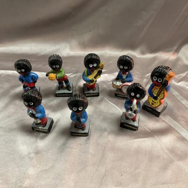 Vintage Robertson Golly figures lot of eight, musicians and footballers.