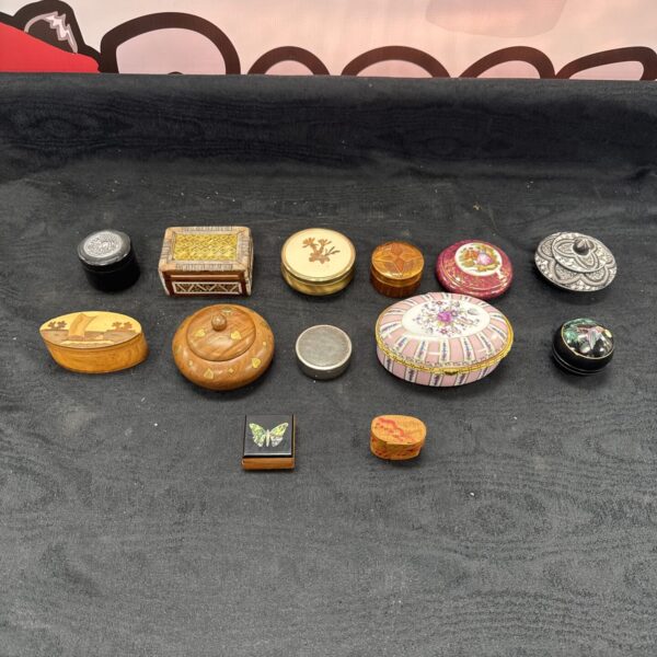 Vintage collection of trinket pots and decorative boxes.