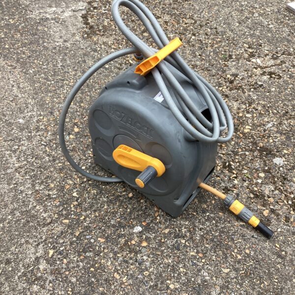 Hozelock hose reel for garden hose storage.