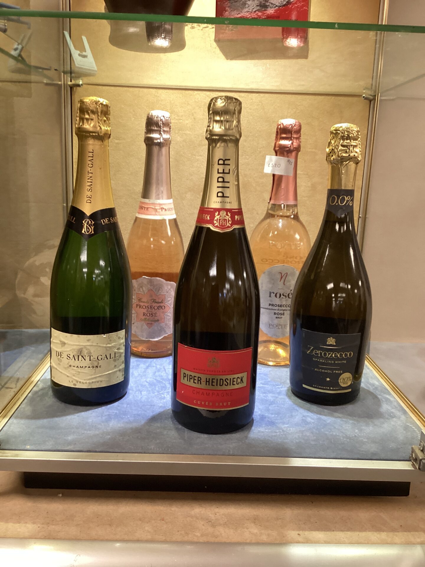 847 Five Bottles of alcohol inc Piper Heidsieck Champagne
