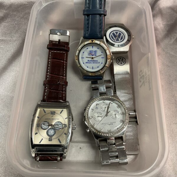Lot of four vintage digital wristwatches, retro electronic timepieces.
