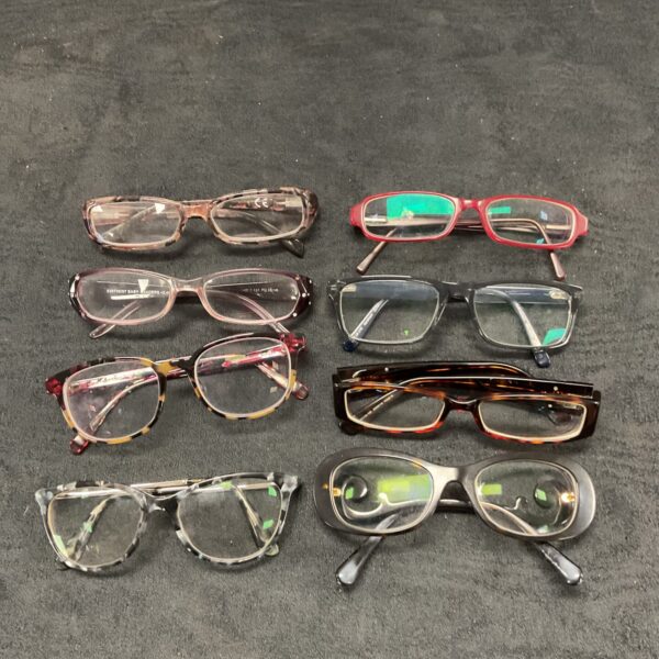 Selection of ladies' glasses including Catch London and Prada frames.