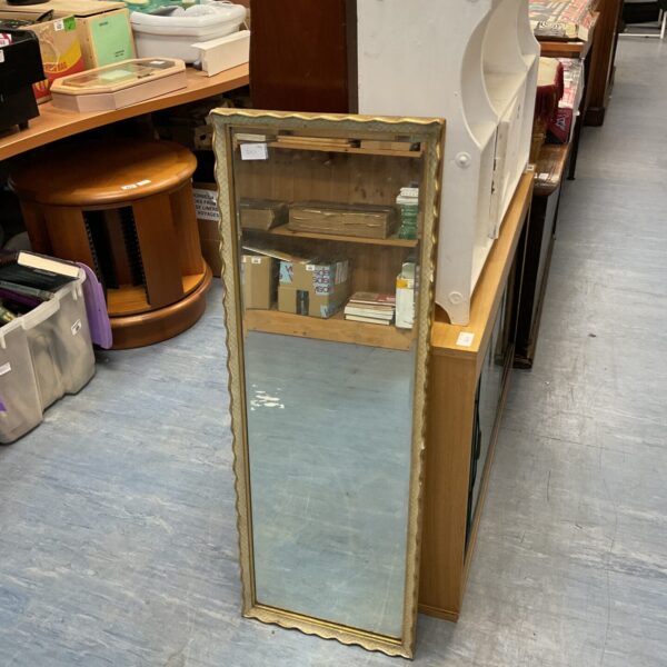 Vintage gilt framed bevel edged mirror for wall decoration.