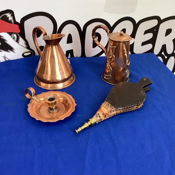Antique copper pitcher, chamberstick, and bellows collection.