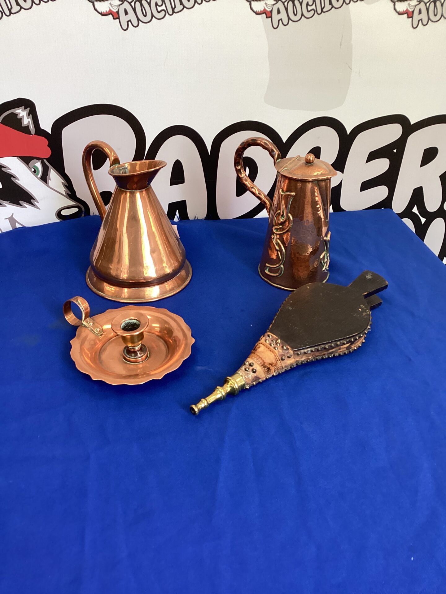 225 Selection of copper inc pitchers, chamberstick & bellows