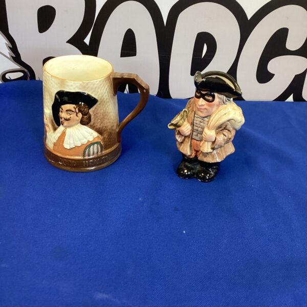 Vintage Falcon Ware pirate mug with detailed character design.