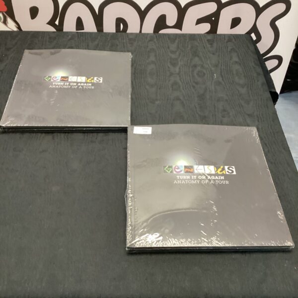 Pair of original Genesis Turn It On Again tour programmes.