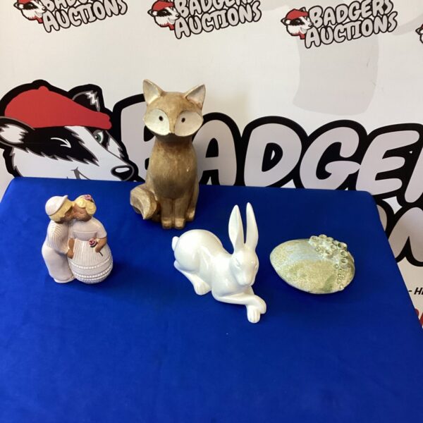 Vintage ceramic fox ornament from a collection of decorative figurines.