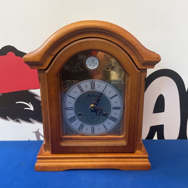 Vintage Bentima radio control mantle clock with wooden casing.