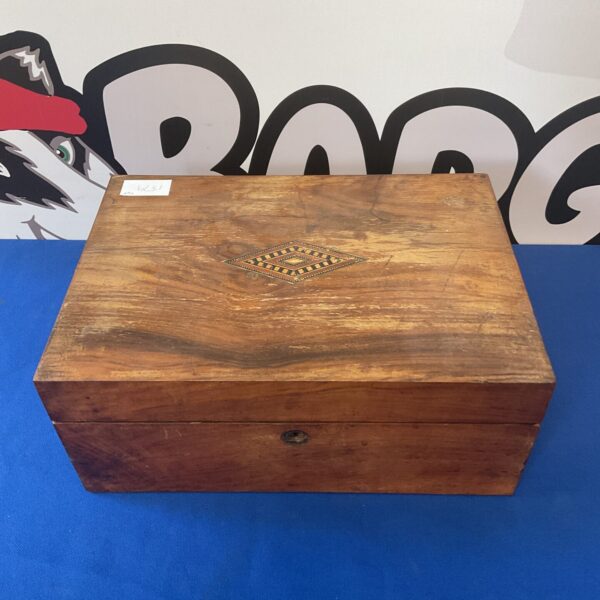 Vintage writing slope with inlaid detail, front view.