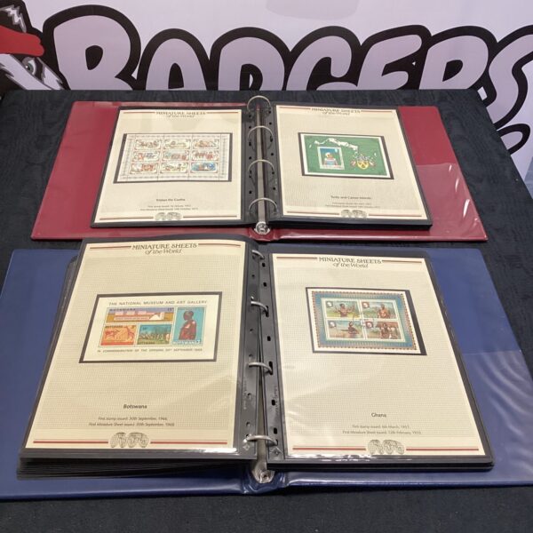 Vintage first day stamp folders with stamp issues inside.