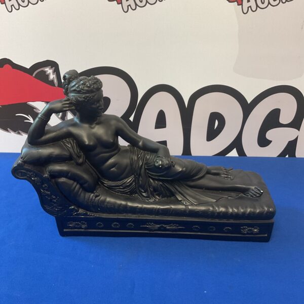 Vintage ceramic reclining Roman lady sculpture for home decor.