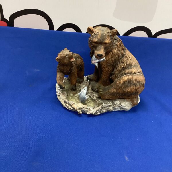 Detailed resin bear and cub sculpture for home decor.