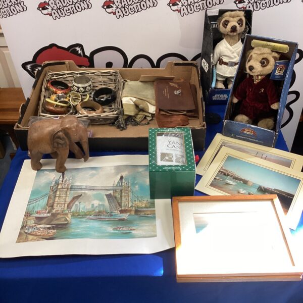 Mixed lot of toys and collectibles including meerkat figures and bangles.