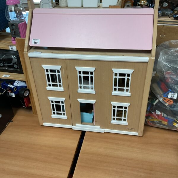 Vintage John Lewis wooden dolls house for collectors.