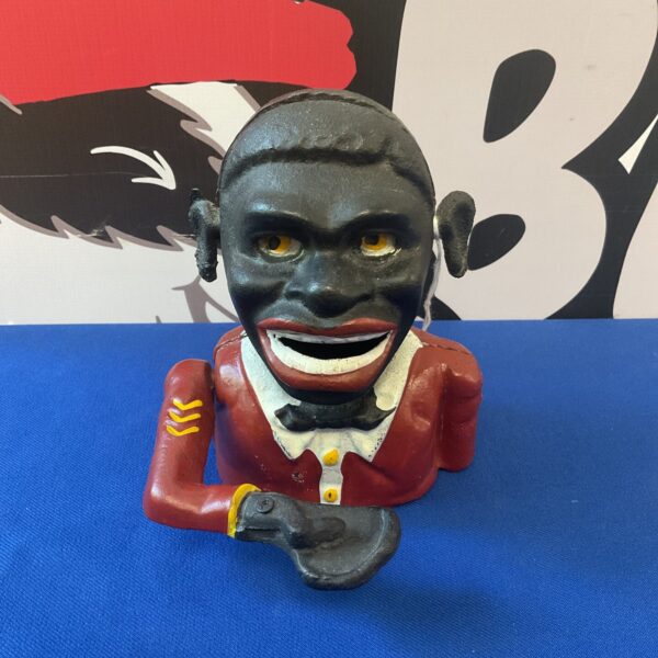 Vintage style cast iron money box, detailed gentleman figurine.