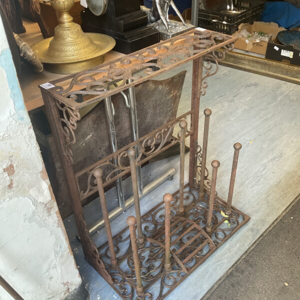 Antique cast iron boot rack for wellington boots.